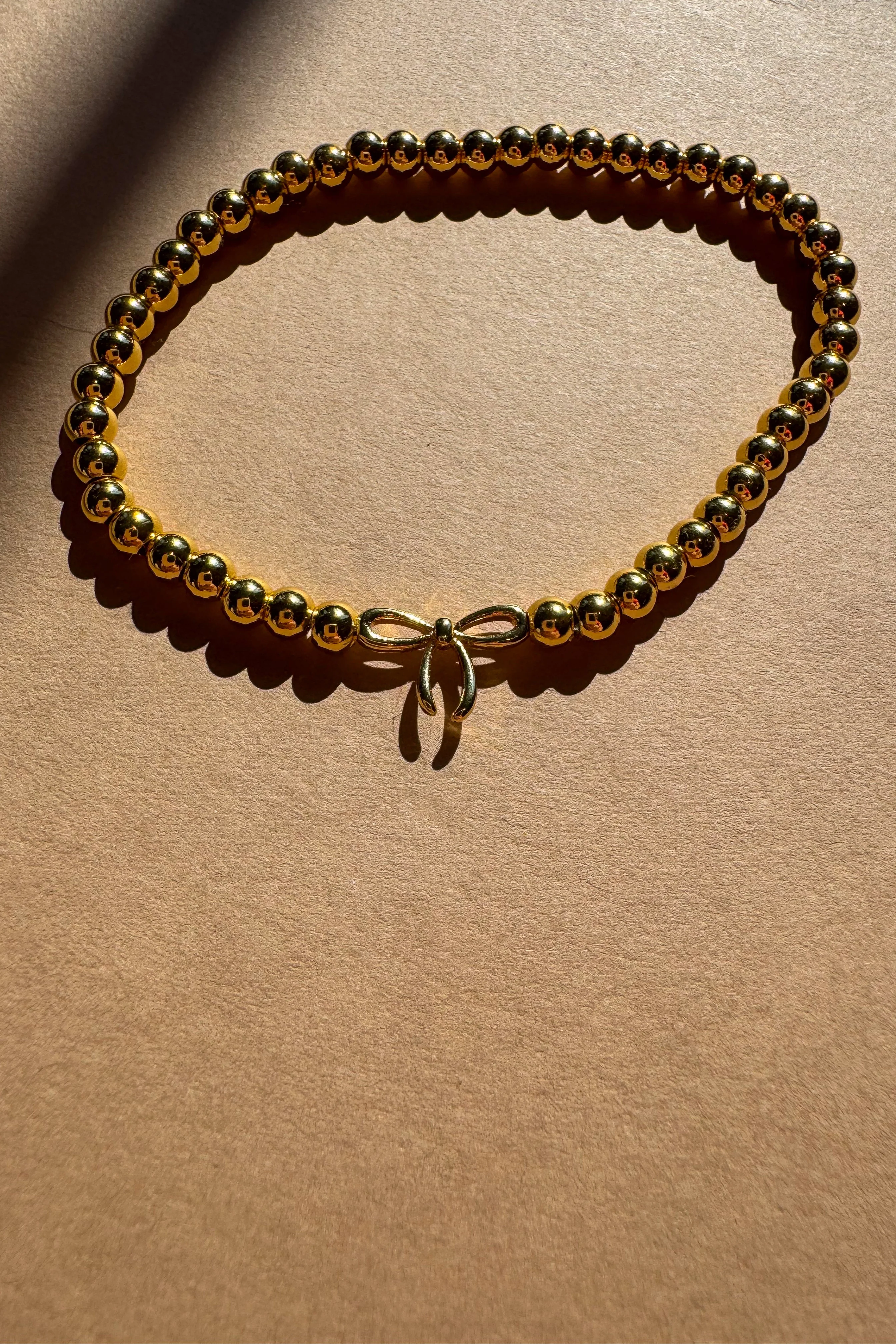 Carmen Gold Beaded Bow Bracelet