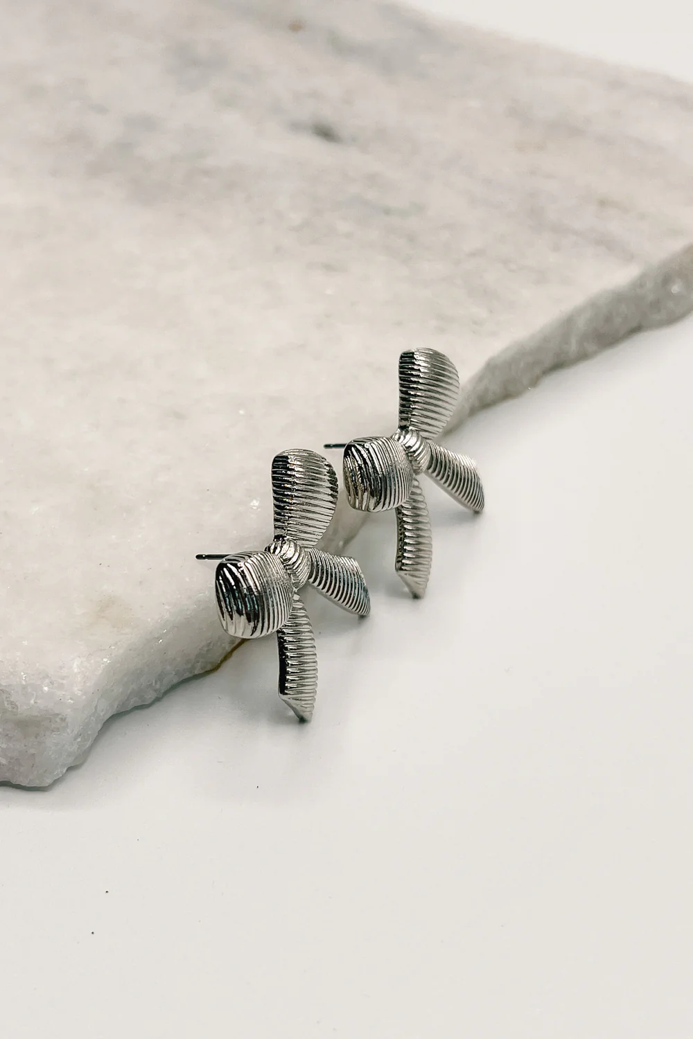 Emmie Silver Ribbed Bow Studs - Image 2