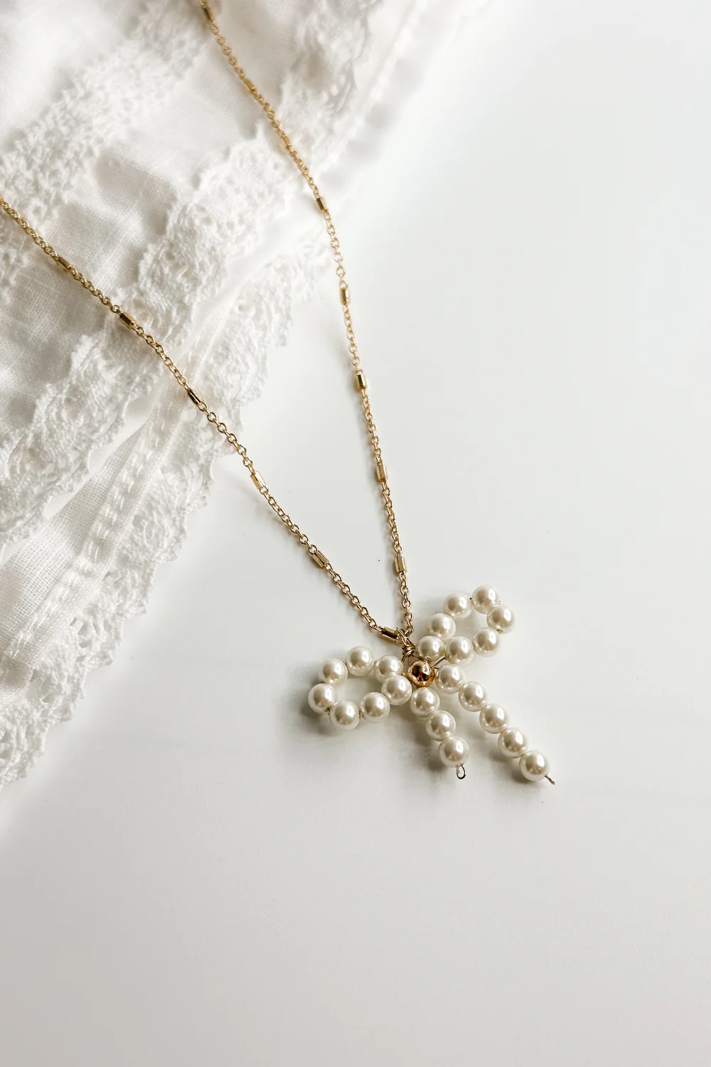Mia Gold & Pearl Bow Necklace