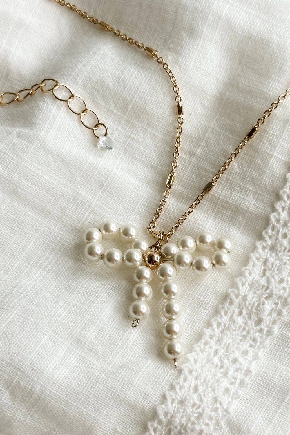 Mia Gold & Pearl Bow Necklace - Image 4